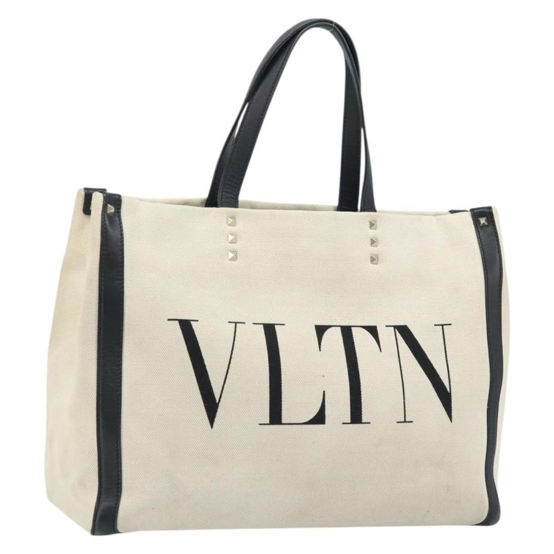 Valentino Beige Canvas Tote with Gold Accents for Women: Valentino Beige Canvas Tote with Gold Accents for Women This Valentino tote bag features a beige and gold canvas exterior, designed for women. The bag is made in Italy and offers a spacious interior s