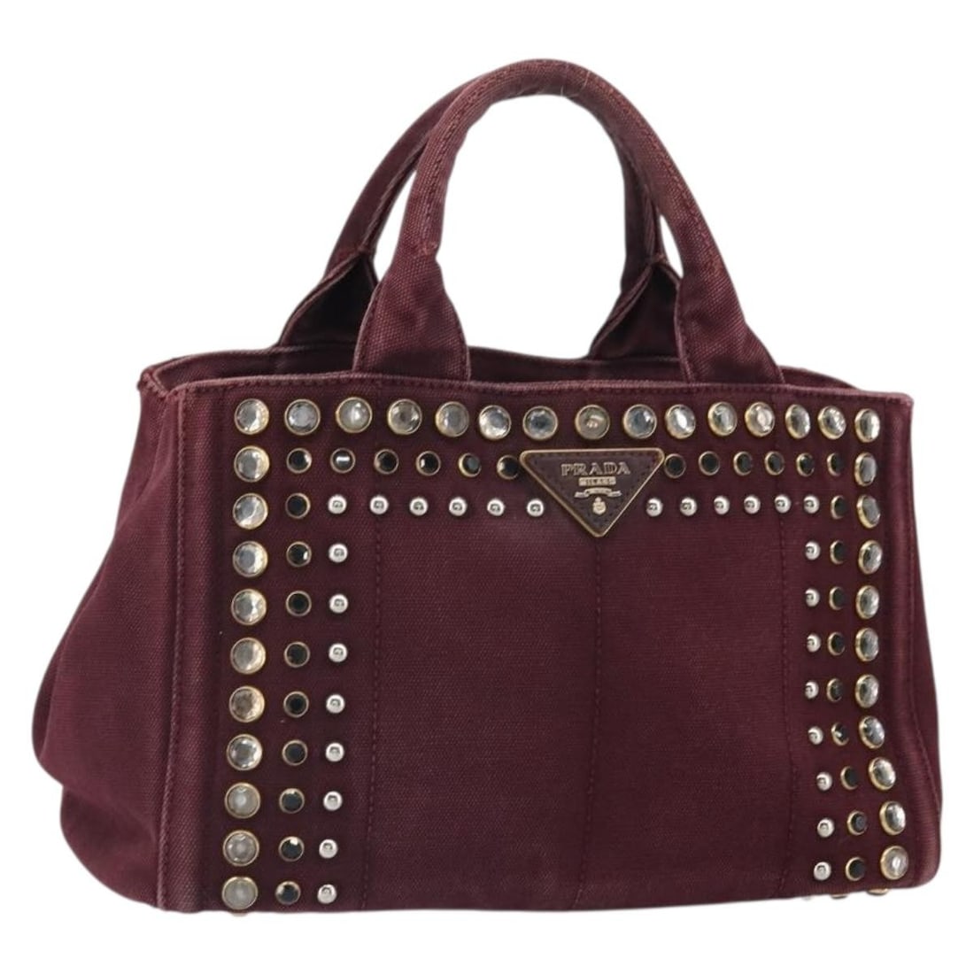 Prada Canapa Mini Bordeaux Canvas Handbag Gold Tone Accents: Prada Canapa Mini Bordeaux Canvas Handbag Gold Tone Accents This PRADA Canapa Mini handbag features a bordeaux and gold color scheme crafted from canvas. Designed for women, it has a structured silhou