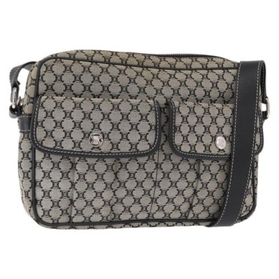 CELINE Macadam Canvas Gray Silver Shoulder Bag Italy: CELINE Macadam Canvas Gray Silver Shoulder Bag Italy This CELINE shoulder bag features the signature Macadam canvas in gray and silver tones. It is designed with an adjustable shoulder strap and silve