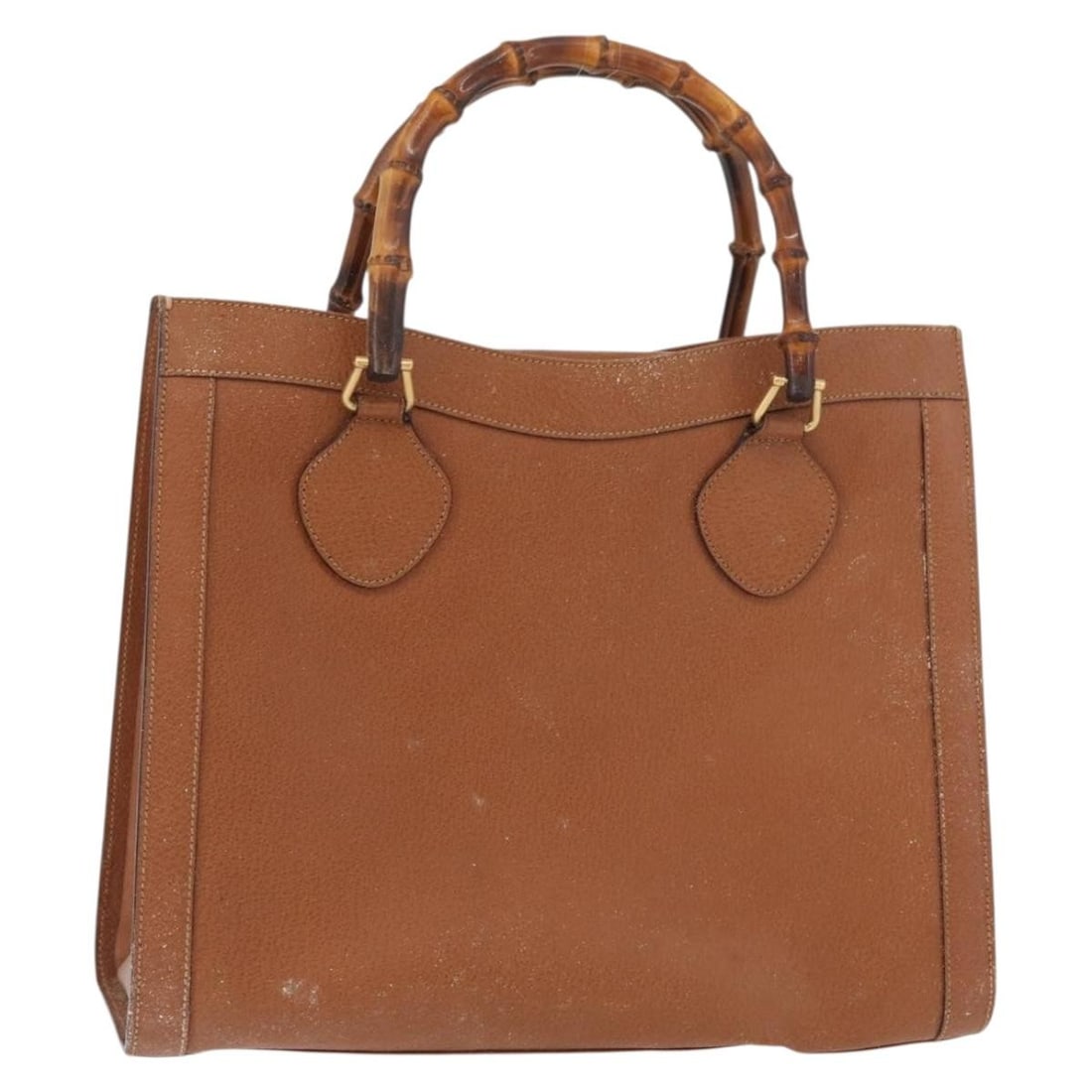 Gucci Bamboo leather brown gold handbag 002 0260 Italy: Gucci Bamboo leather brown gold handbag 002 0260 Italy This GUCCI Bamboo Hand Bag is crafted from brown and gold leather and features a classic bamboo handle design. The bag is made in Italy and is pa