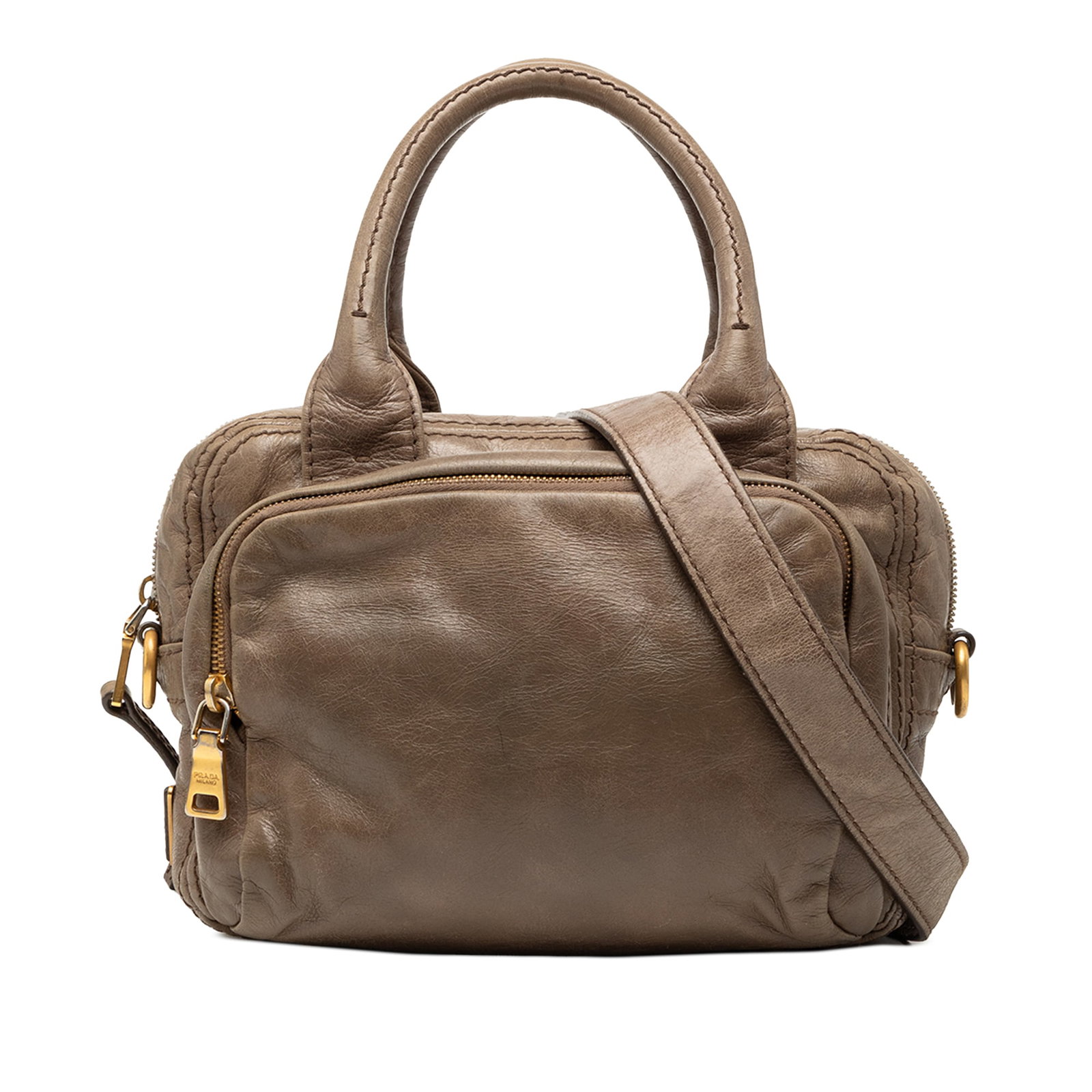 Brown Leather Prada Vitello Shine Bauletto Satchel with Detachable Strap: Brown Leather Prada Vitello Shine Bauletto Satchel with Detachable Strap The Prada Vitello Shine Bauletto Satchel is crafted from brown leather and designed with rolled leather handles and a detachabl