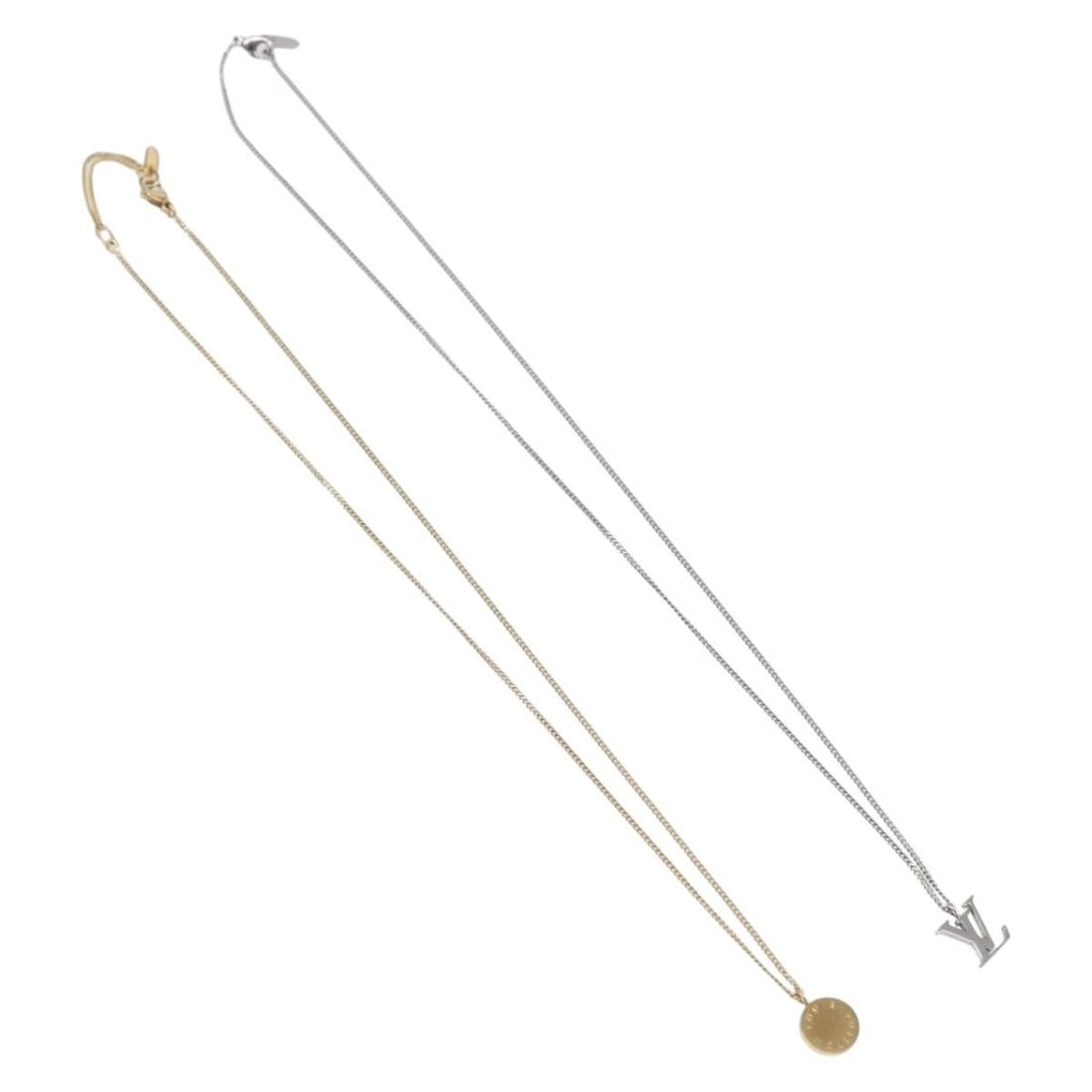 Set of Two Louis Vuitton Gold Tone Necklaces with Pendants: Set of Two Louis Vuitton Gold Tone Necklaces with Pendants This is an authentic pair of Louis Vuitton necklaces and pendants in the LV ET Pastille 18 750 design. Crafted in gold-tone metal, the neckla