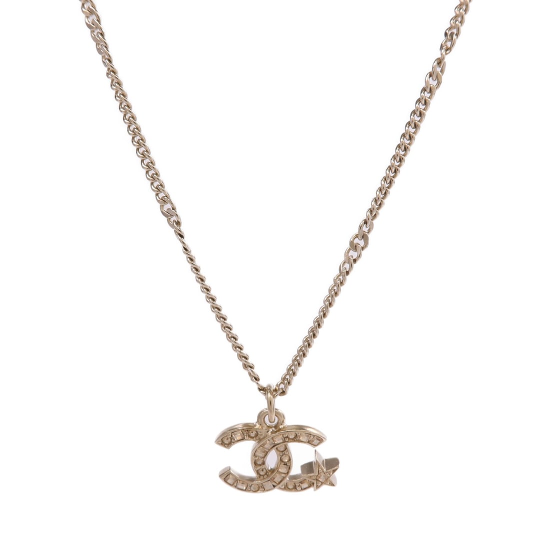 Gold Tone Necklace with CC Emblem by CHANEL: Gold Tone Necklace with CC Emblem by CHANEL This CHANEL necklace features the iconic CC motif and is crafted from gold-toned metal. Designed without a main stone, it offers a sophisticated and timeles