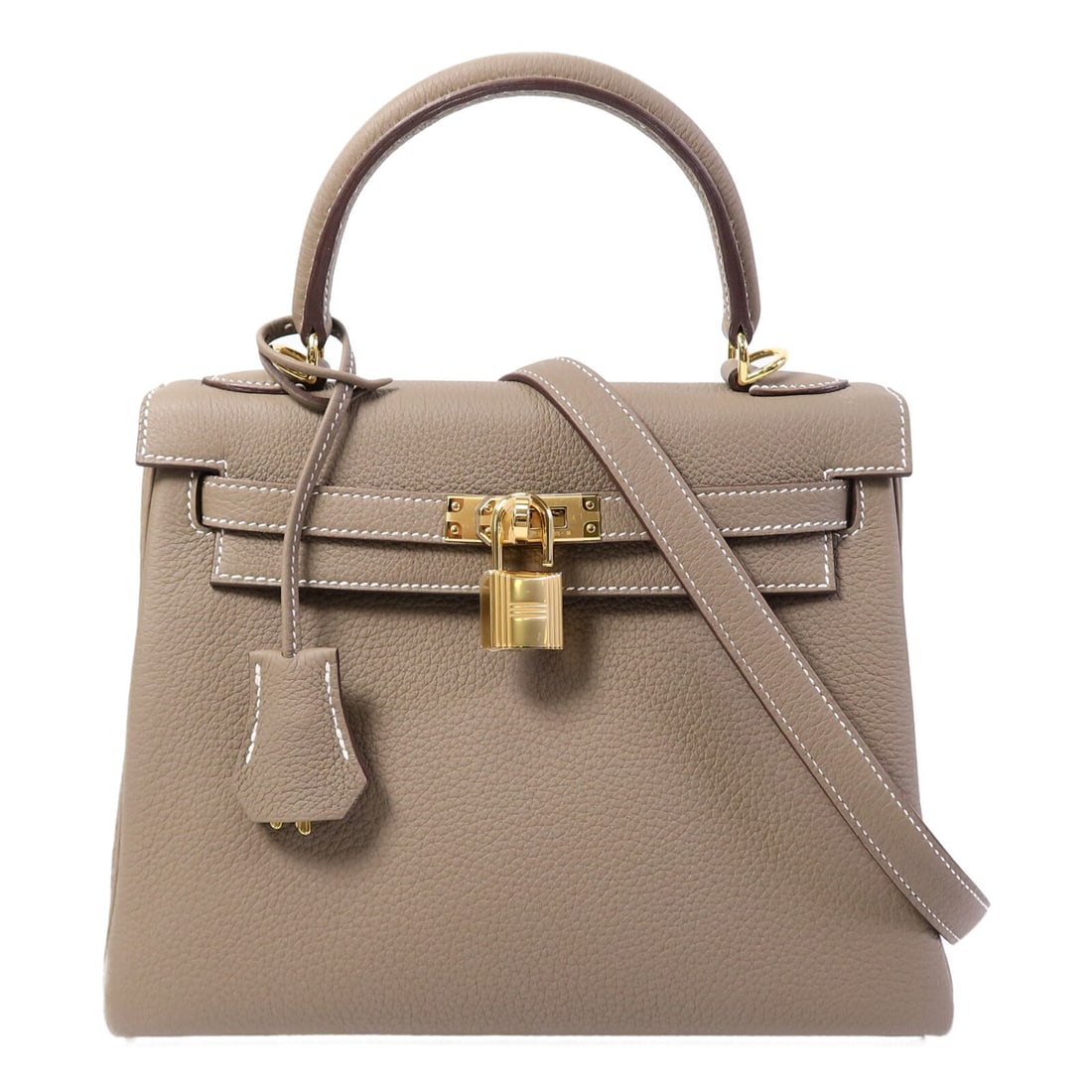 Hermes Kelly 25 Etoupe Togo Leather Shoulder Bag GHW: Hermes Kelly 25 Etoupe Togo Leather Shoulder Bag GHW This Hermes Kelly 25 is a versatile 2-way shoulder bag crafted from premium Togo calfskin leather in an elegant brown Etoupe color. Designed for bo