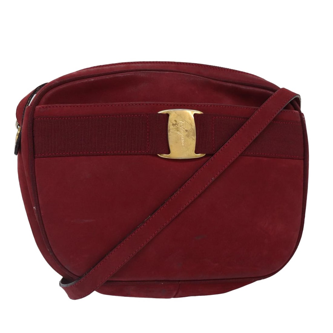 Salvatore Ferragamo Red Suede Shoulder Bag with Gold Accents: Salvatore Ferragamo Red Suede Shoulder Bag with Gold Accents This Salvatore Ferragamo shoulder bag features a red suede exterior with gold accents, designed for women. Made in Italy, the bag offers a 