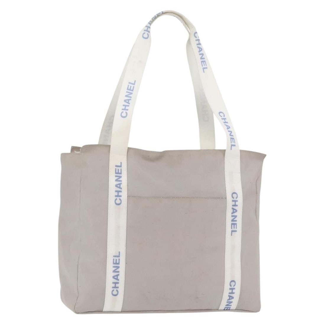 CHANEL Gray Silver Canvas Tote Bag France Auth: CHANEL Gray Silver Canvas Tote Bag France Auth This CHANEL tote bag features a gray and silver canvas exterior, offering a spacious and practical design. Made in France, it is designed for women and i