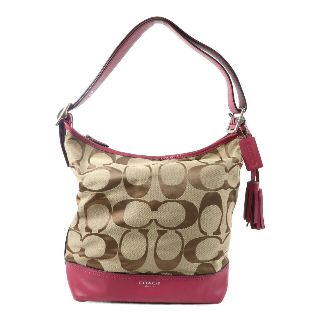 Coach Legacy Pink Canvas Duffle Shoulder Bag with Silver Hardware: Coach Legacy Pink Canvas Duffle Shoulder Bag with Silver Hardware This COACH Legacy Signature Duffle Shoulder Bag features a pink canvas exterior and is designed for women. The bag offers a spacious i