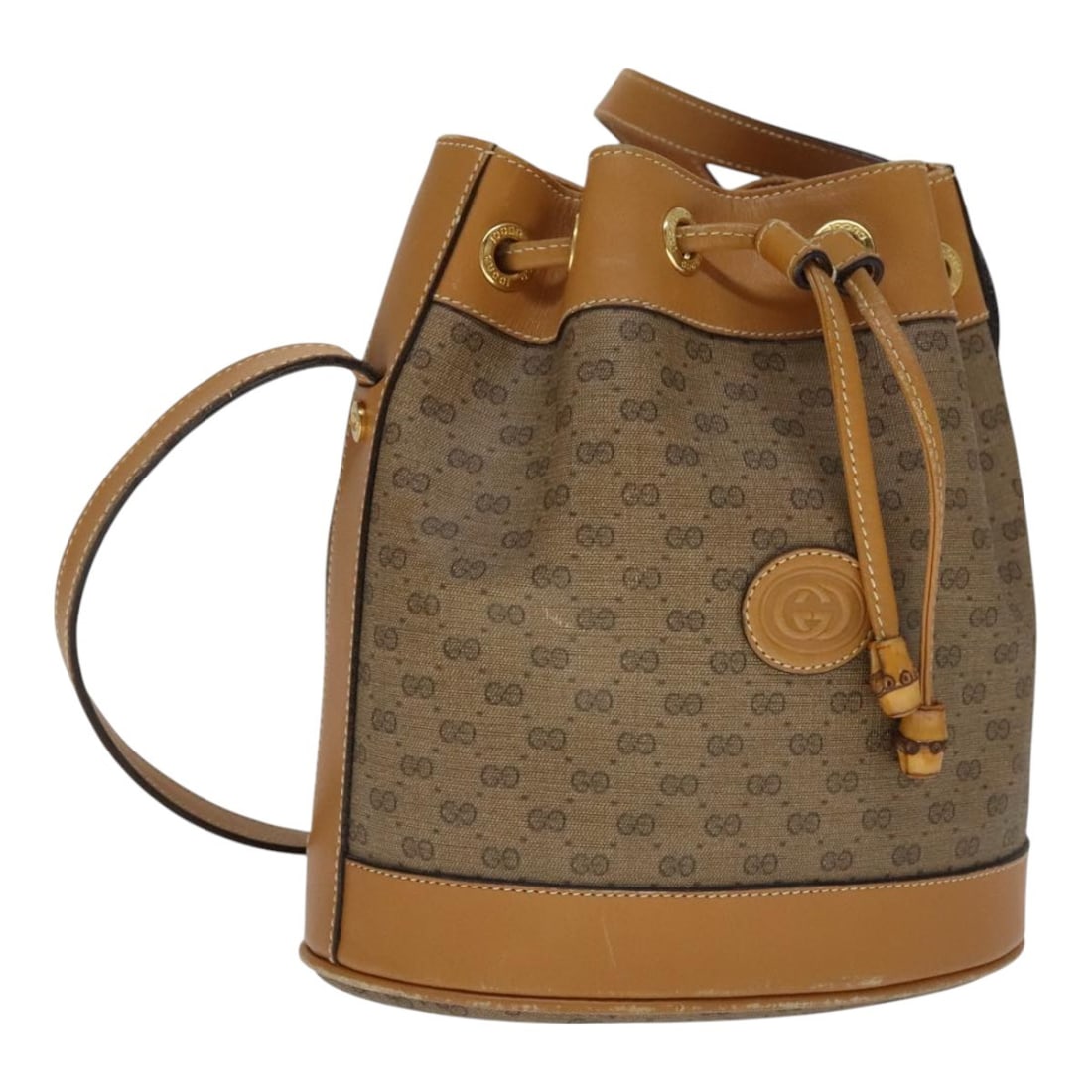 Gucci Micro GG Supreme Brown PVC Leather Shoulder Bag 007 14 0071 Italy: Gucci Micro GG Supreme Brown PVC Leather Shoulder Bag 007 14 0071 Italy This Gucci Micro GG Supreme shoulder bag features a brown PVC leather exterior with micro small GG canvas detailing. The bag is 