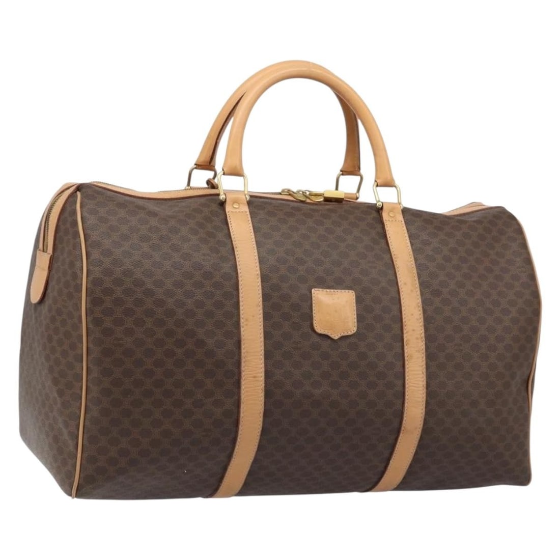 Celine Macadam Canvas Brown Boston Bag with PVC Leather and Gold Accents: Celine Macadam Canvas Brown Boston Bag with PVC Leather and Gold Accents This CELINE Macadam Canvas Boston Bag features a classic brown and gold design crafted from PVC leather and Macadam canvas. Des