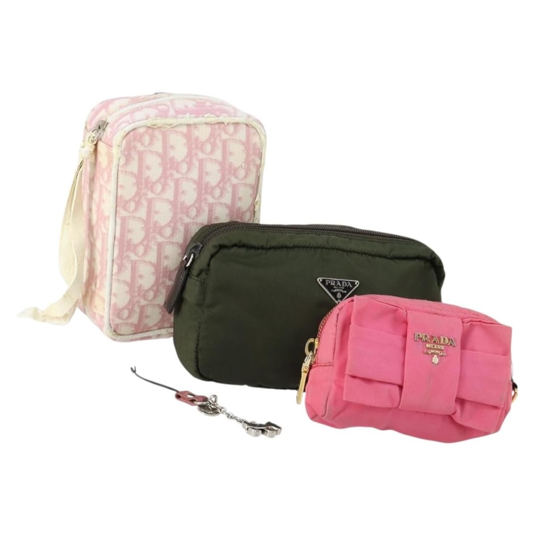 Set of 4 Christian Dior Pink Khaki Nylon Pouches: Set of 4 Christian Dior Pink Khaki Nylon Pouches This is a set of four Christian Dior pouches crafted from nylon in pink and khaki shades. The set does not include an item box or dust bag. The conditi