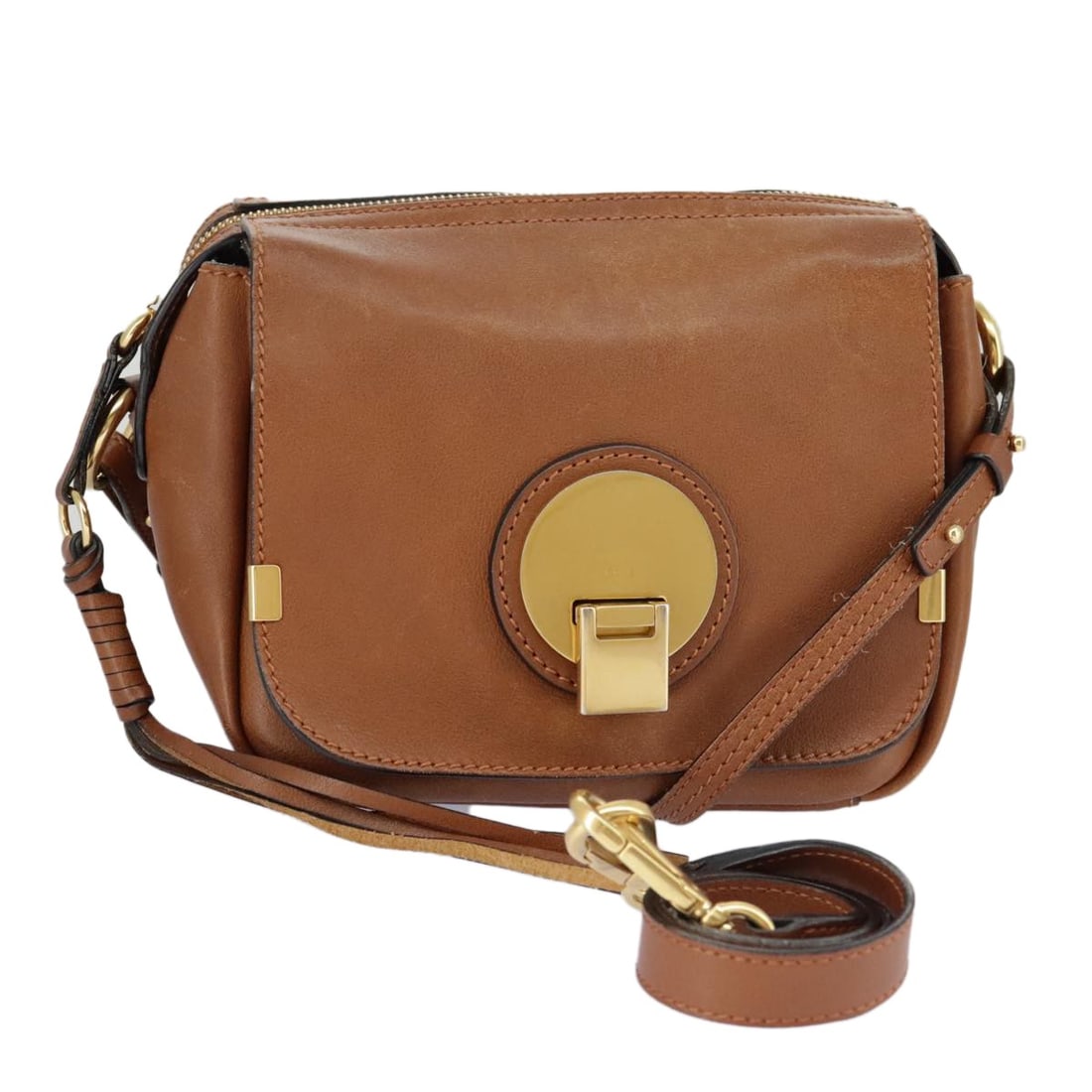 Chloe Indy Brown Leather Shoulder Bag with Gold Accents: Chloe Indy Brown Leather Shoulder Bag with Gold Accents This Chloe Indy shoulder bag is crafted from brown and gold leather and designed for women. Made in Italy, it features a compact silhouette with