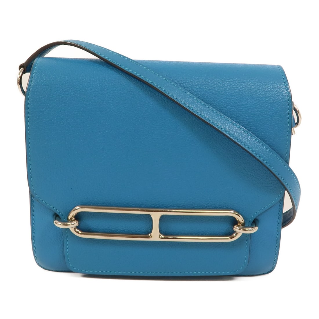 Hermes Roulis Mini Bleu Zanzibar Evercolor Leather Shoulder Bag: Hermes Roulis Mini Bleu Zanzibar Evercolor Leather Shoulder Bag This Hermes Roulis Mini Shoulder Bag is crafted from Evercolor calfskin leather in a striking Bleu Zanzibar shade. Designed for women, t