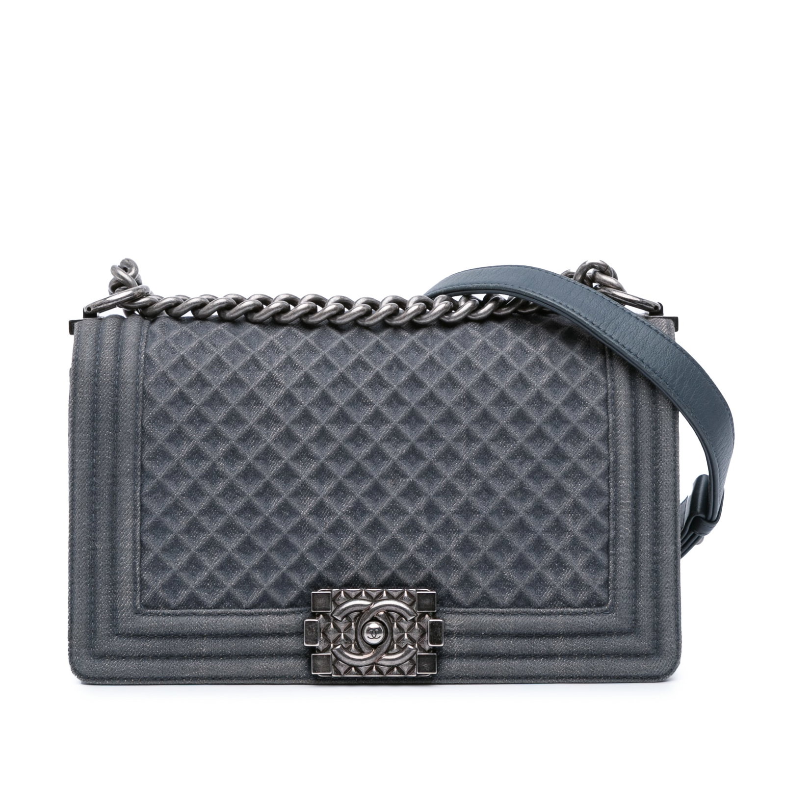 Chanel Medium Blue Embossed Denim Boy Flap Bag: Chanel Medium Blue Embossed Denim Boy Flap Bag This Chanel Medium Embossed Denim Boy Flap bag showcases a stylish embossed denim body, complemented by a curb chain strap featuring an adjustable flat