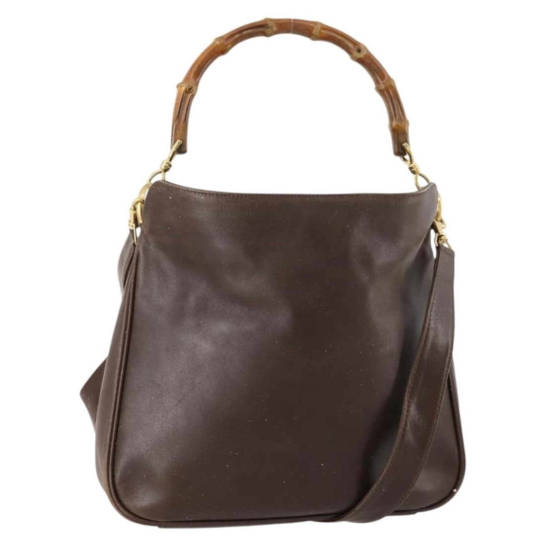 Gucci Bamboo Leather Brown Gold Two Way Handbag with Shoulder Strap: Gucci Bamboo Leather Brown Gold Two Way Handbag with Shoulder Strap This GUCCI handbag features a classic bamboo handle design and can be carried by hand or worn as a shoulder bag with the included st