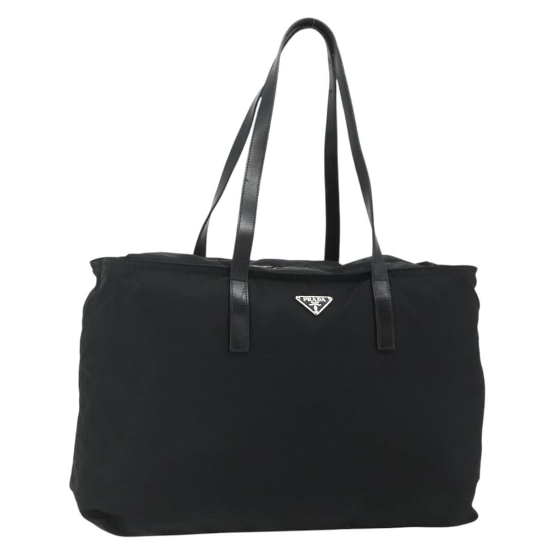 Prada black nylon women tote bag Italy silver trim: Prada black nylon women tote bag Italy silver trim This PRADA tote bag is crafted from black nylon with silver-tone detailing. Designed for women, it features a spacious interior and comfortable handl