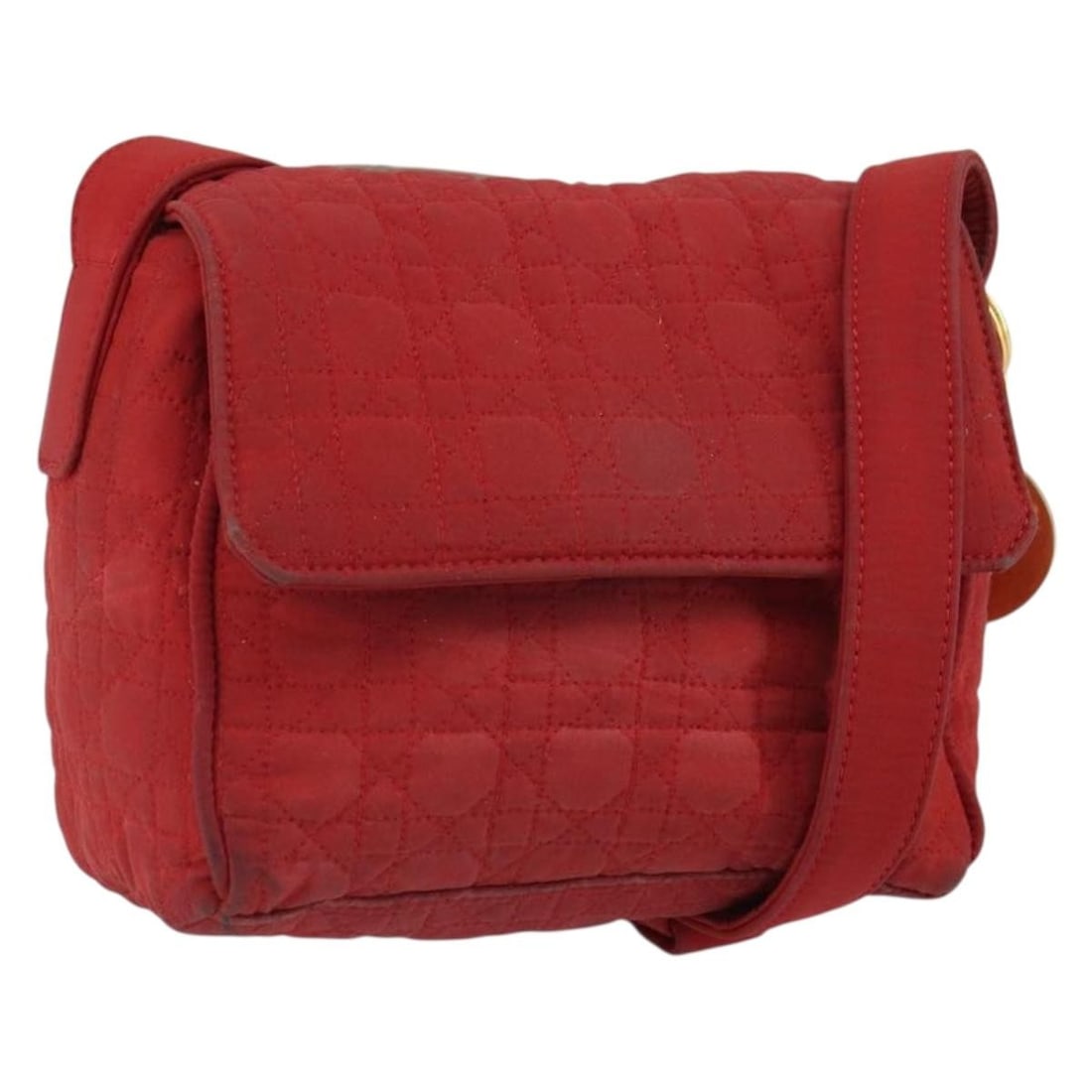 Christian Dior Red Gold Nylon Shoulder Bag with Charm: Christian Dior Red Gold Nylon Shoulder Bag with Charm This Christian Dior Canage shoulder bag is crafted from red and gold nylon and features a matching gold-tone charm. Designed for women, the bag is