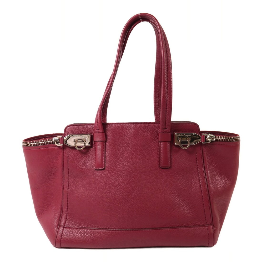 Red Calfskin Salvatore Ferragamo Shoulder Bag with Silver Hardware: Red Calfskin Salvatore Ferragamo Shoulder Bag with Silver Hardware This Salvatore Ferragamo shoulder bag is crafted from high-quality calfskin leather in a striking red color. Designed for women, it f