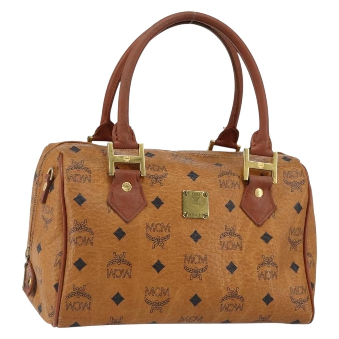 MCM Logogram Vicetos Brown Gold PVC Leather Hand Bag BA7689: MCM Logogram Vicetos Brown Gold PVC Leather Hand Bag BA7689 This MCM Logogram Vicetos Hand Bag is crafted from durable PVC leather in a sophisticated brown and gold color scheme. Measuring approximate