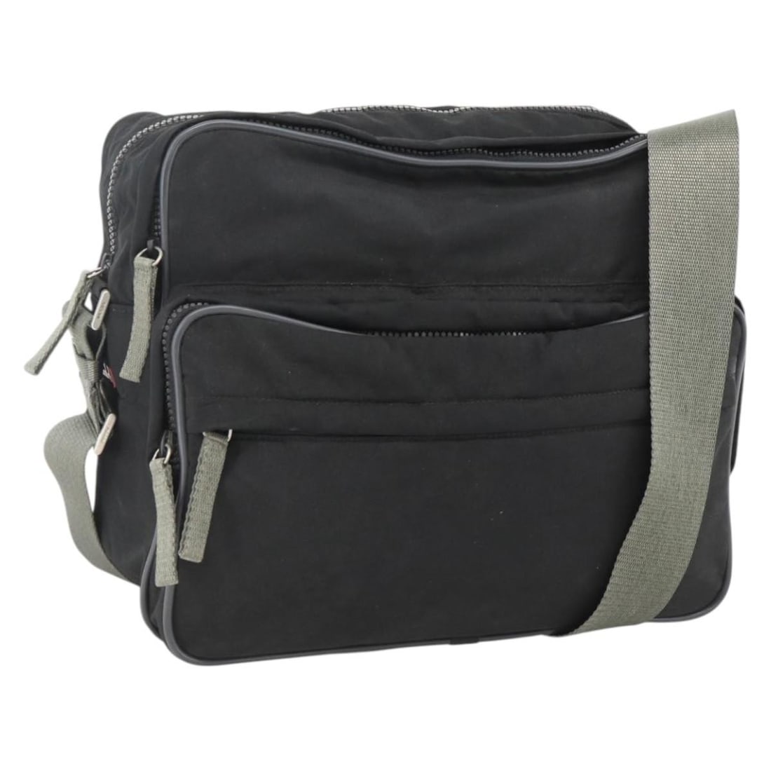 Prada Nylon Sports Shoulder Bag Black and Silver with Guarantee Card: Prada Nylon Sports Shoulder Bag Black and Silver with Guarantee Card This PRADA Sports shoulder bag features a black and silver nylon exterior, designed for women. The bag offers ample storage with it