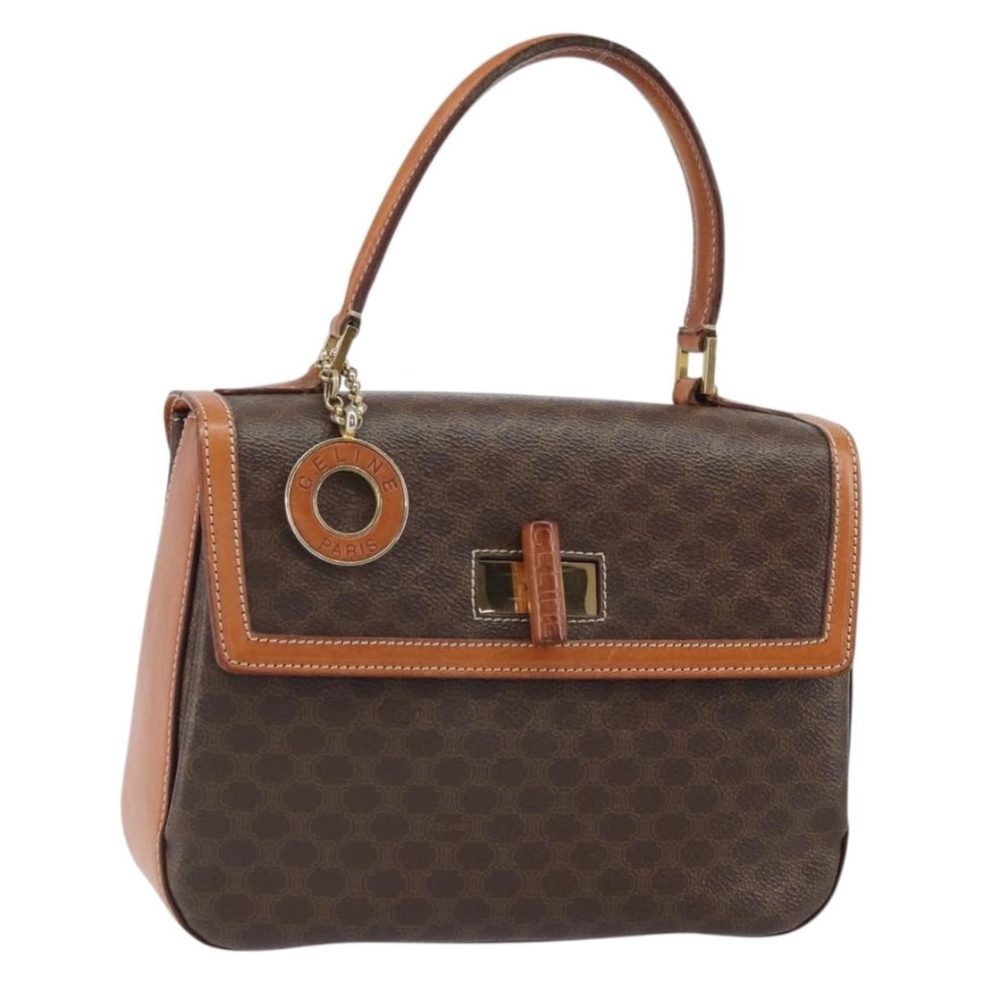 Celine Macadam Brown PVC Leather Handbag Gold Accents Italy: Celine Macadam Brown PVC Leather Handbag Gold Accents Italy This CELINE Macadam hand bag features a brown and gold PVC leather exterior with signature detailing. Crafted in Italy, it offers a compact 