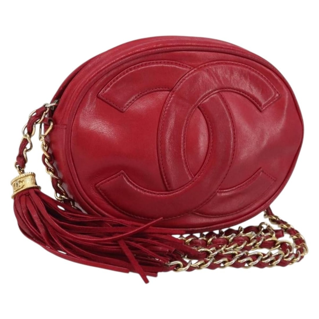 Red Lambskin Shoulder Bag with Gold Chain by CHANEL: Red Lambskin Shoulder Bag with Gold Chain by CHANEL This CHANEL chain shoulder bag is crafted from lambskin leather in a striking red color with gold-tone accents. Designed for women, the bag features
