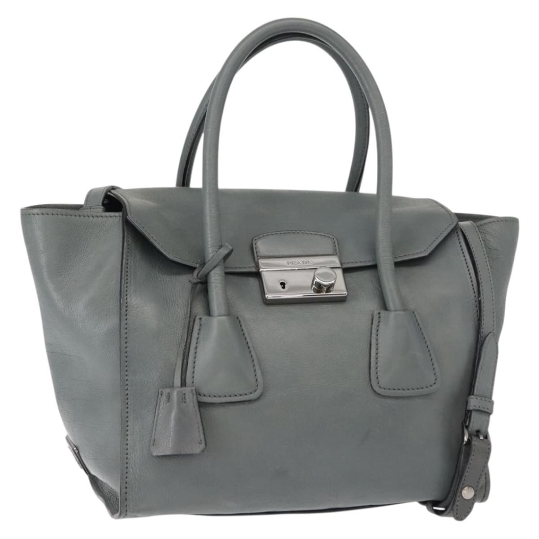 PRADA Gray Silver Leather Hand Bag Authentic 149313: PRADA Gray Silver Leather Hand Bag Authentic 149313 This PRADA hand bag is an elegant blend of style and practicality, crafted from high-quality leather in a sophisticated gray and silver color scheme