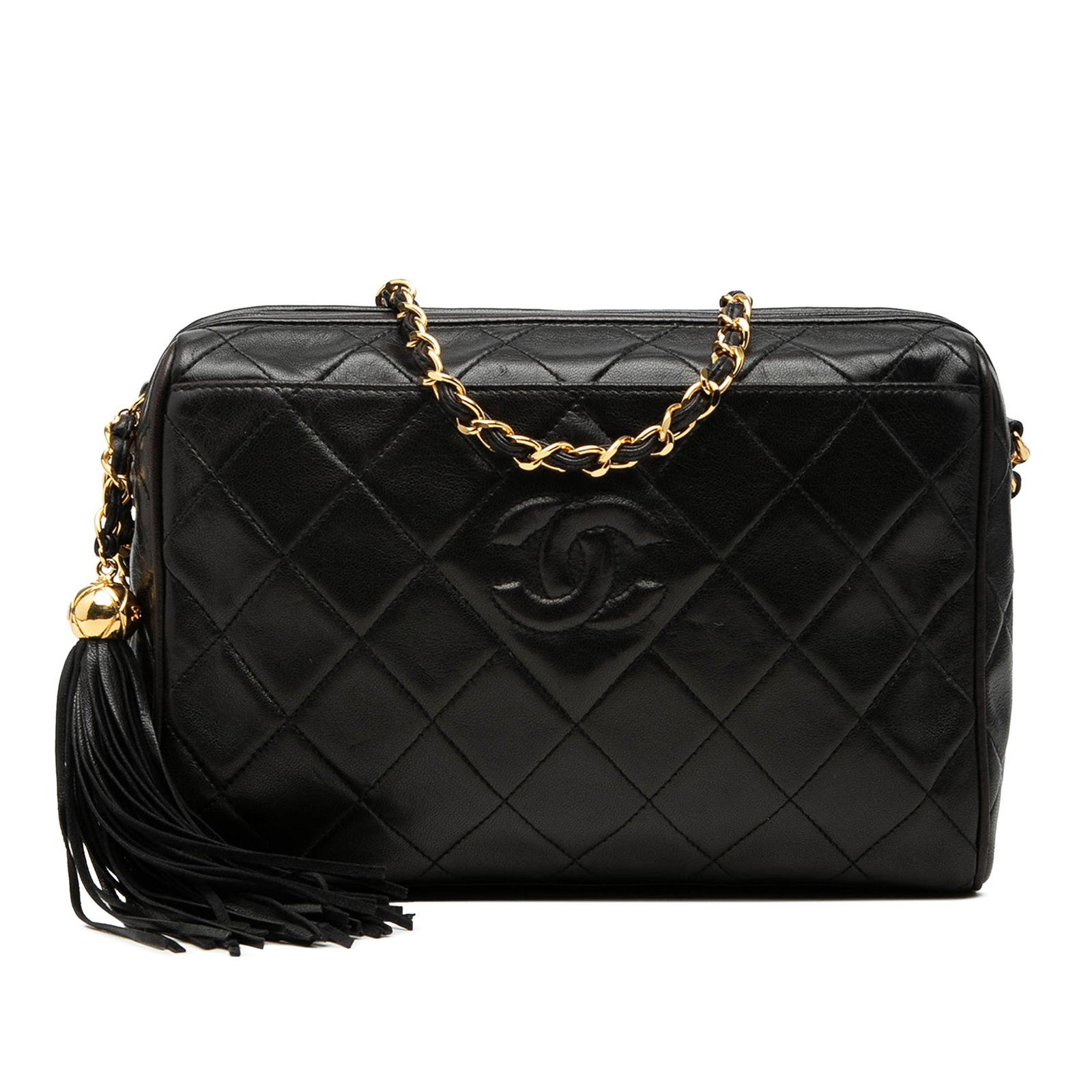 Black Lambskin Quilted Camera Crossbody with Tassel by Chanel CC: Black Lambskin Quilted Camera Crossbody with Tassel by Chanel CC This Chanel CC Diamond Quilted Lambskin Tassel Camera Bag features a quilted lambskin leather exterior in black with a flat leather sho