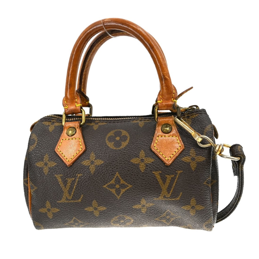Louis Vuitton Mini Speedy Monogram Canvas Two Way Brown Handbag M41534: Louis Vuitton Mini Speedy Monogram Canvas Two Way Brown Handbag M41534 This Louis Vuitton Monogram Mini Speedy 2-way handbag features signature monogram canvas leather in brown with a zip closure, des