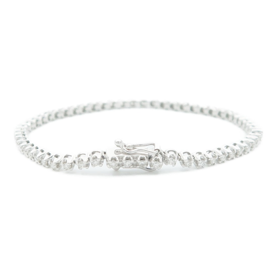 Diamond Bracelet in 18K White Gold JEWELRY: Diamond Bracelet in 18K White Gold JEWELRY This elegant bracelet is crafted from 18K white gold and features sparkling diamonds, offering a refined and sophisticated accessory for women. The bracelet 