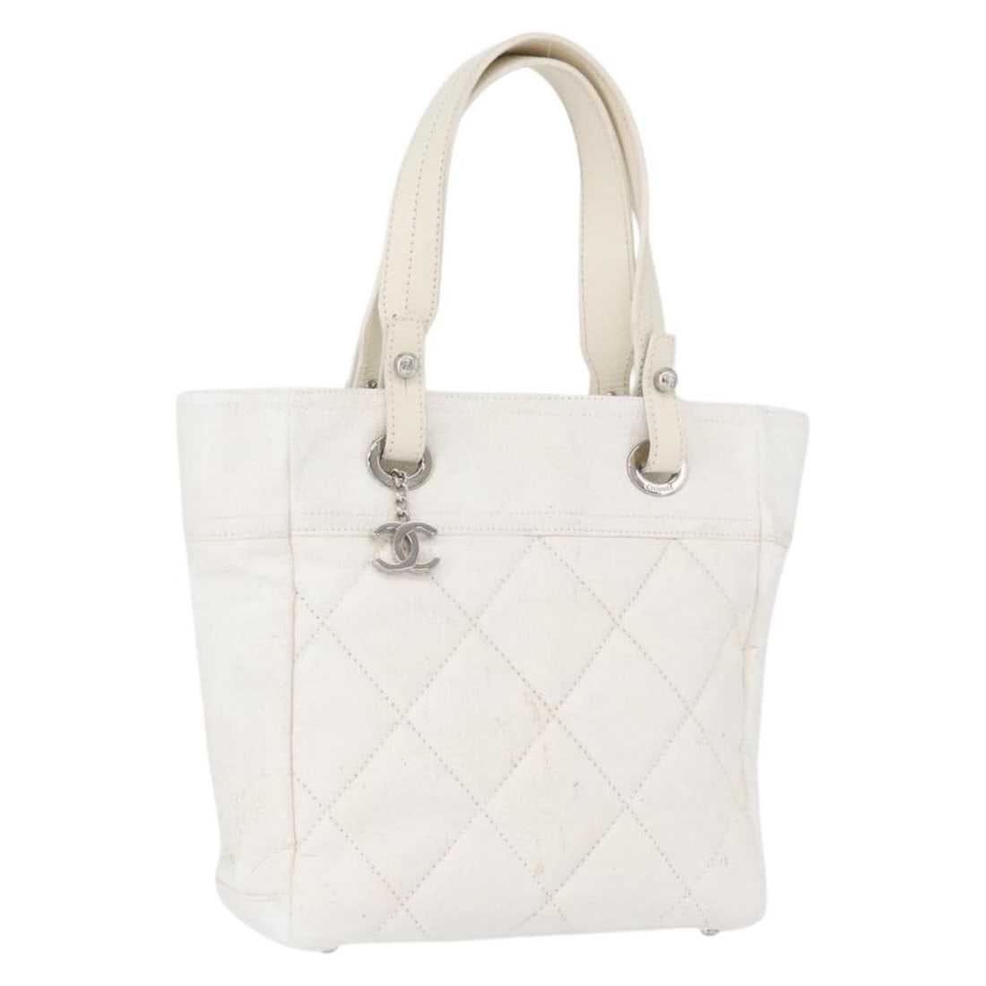 CHANEL Silver White Leather Tote Bag Italy CC Auth: CHANEL Silver White Leather Tote Bag Italy CC Auth This CHANEL tote bag features a silver and white leather exterior and is designed for women. Made in Italy, the bag has a handle drop of approximatel