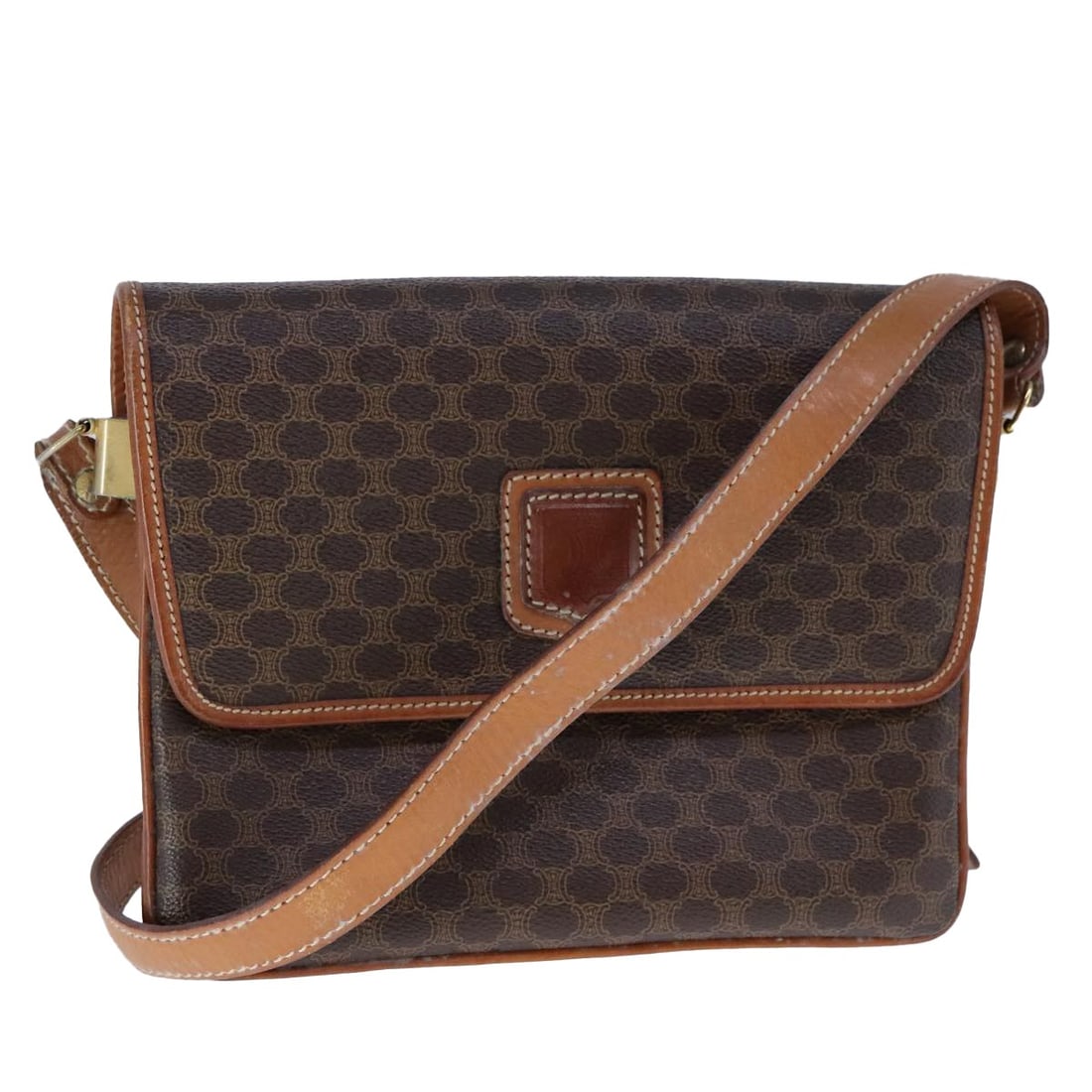 Celine Macadam Brown Shoulder Bag PVC Leather and Canvas Italy: Celine Macadam Brown Shoulder Bag PVC Leather and Canvas Italy This CELINE shoulder bag features the iconic Macadam canvas with brown PVC leather accents. Designed for women, it offers a classic silho