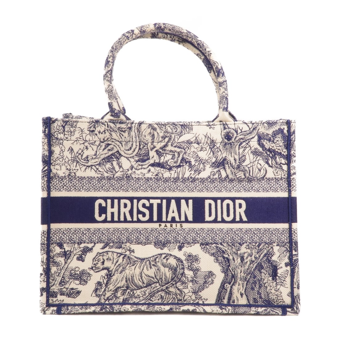 Dior Book Tote Medium Blue White Canvas Women: Dior Book Tote Medium Blue White Canvas Women This Christian Dior Book Tote Medium is crafted from blue and white canvas and features a spacious open-top design. The bag is designed for women and offe
