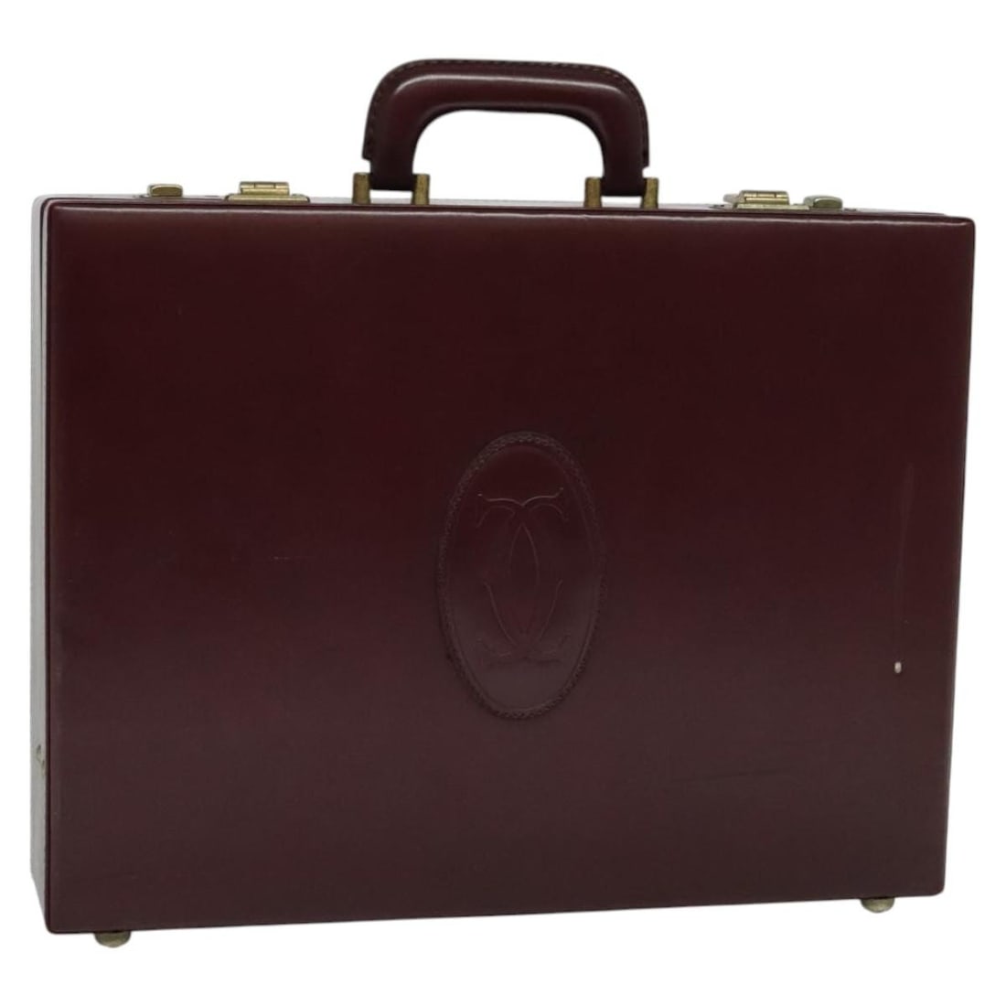 Red and Gold Leather Trunk by Cartier with Dual Keys: Red and Gold Leather Trunk by Cartier with Dual Keys This Cartier trunk features a red and gold leather exterior with a structured silhouette. Designed for women, it includes a handle with a drop of a