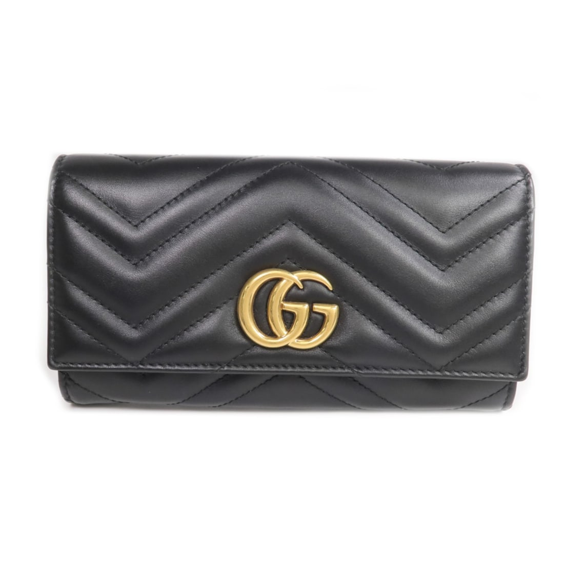 Black GG Marmont Long Bifold Wallet by Gucci with Calfskin Leather and GHW: Black GG Marmont Long Bifold Wallet by Gucci with Calfskin Leather and GHW This Gucci GG Marmont long wallet features a bifold design crafted from black calfskin leather. Designed for women, it offers