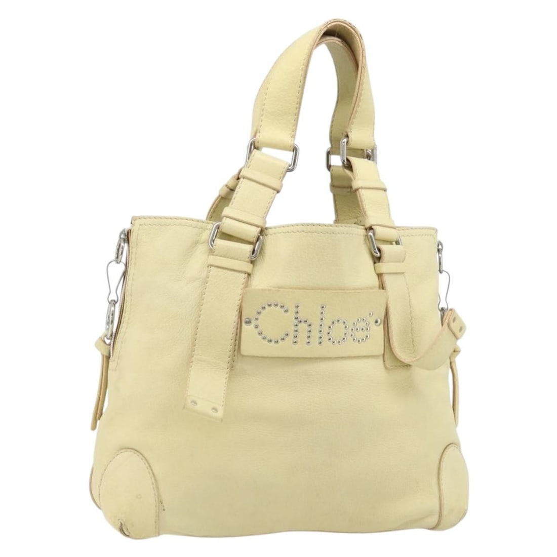 Chloe Yellow Leather Tote Bag with Silver Accents for Women: Chloe Yellow Leather Tote Bag with Silver Accents for Women This Chloe tote bag features a yellow and silver leather exterior, designed for women. The bag is made in Romania and includes a spacious in