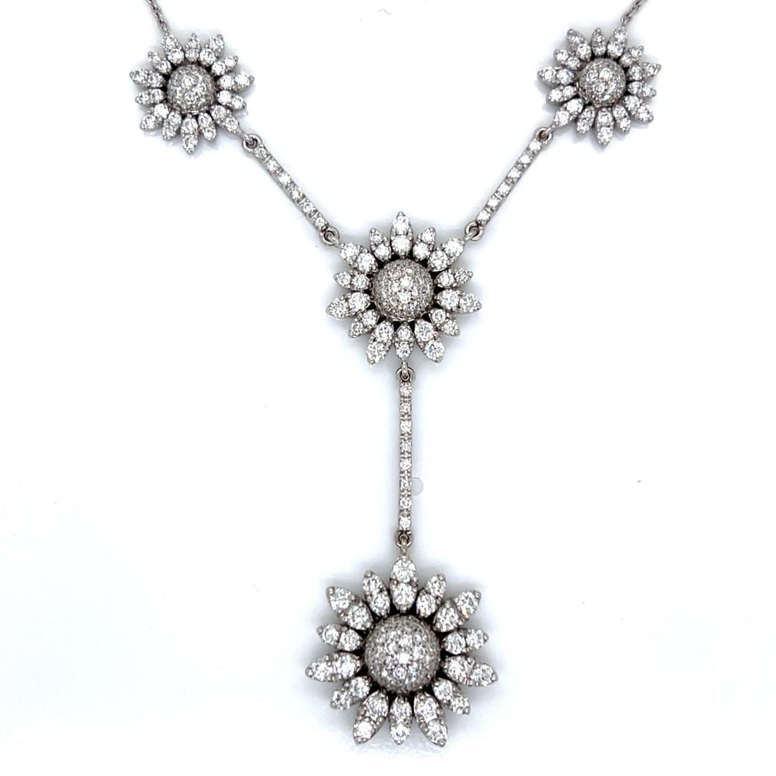 Vintage 1960s Diamond Necklace in 18K White Gold 5.00 Carats: Vintage 1960s Diamond Necklace in 18K White Gold 5.00 Carats This 1960s necklace features approximately 5.00 carats of diamonds set in 18K white gold. The diamonds are F-G color with VVS-VS clarity. T