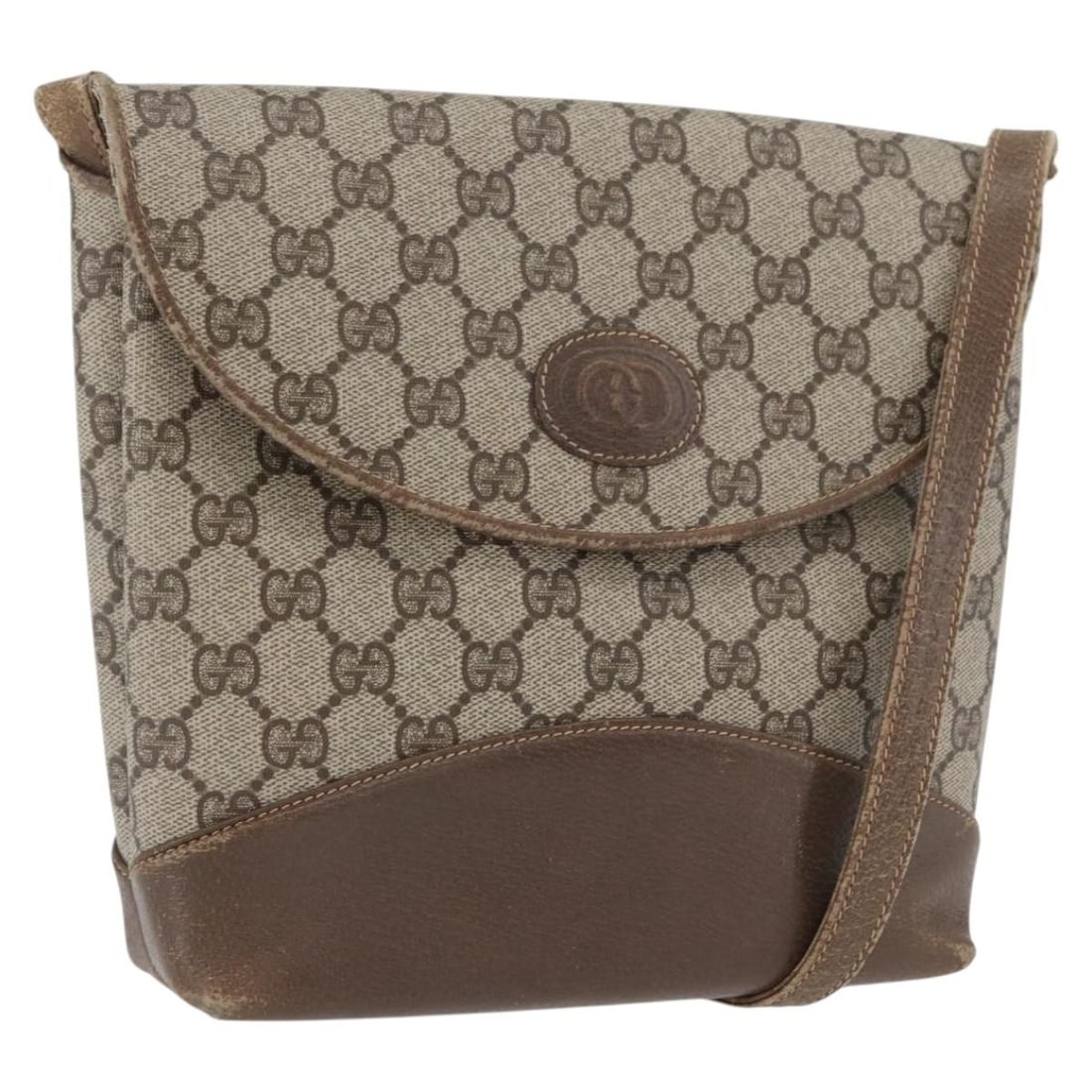Beige GG Supreme PVC Shoulder Bag by Gucci Gold Accents: Beige GG Supreme PVC Shoulder Bag by Gucci Gold Accents This is a Gucci GG Supreme shoulder bag crafted from beige and gold PVC leather with GG canvas accents. Designed for women, the bag features a c