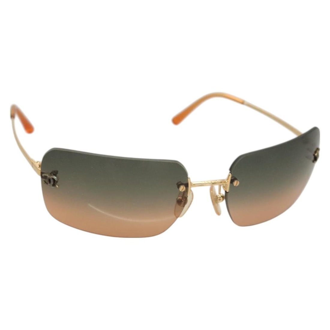 Authentic CHANEL Brown Plastic Sunglasses Made in Italy: Authentic CHANEL Brown Plastic Sunglasses Made in Italy Elevate your style with these authentic CHANEL sunglasses, crafted in Italy. Featuring a sleek brown plastic frame, these sunglasses are a perfe