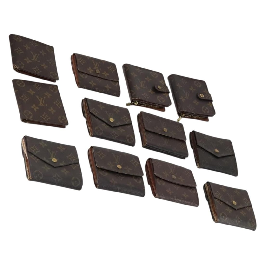 LOUIS VUITTON Monogram Wallet Set 12 Authenticated LV: LOUIS VUITTON Monogram Wallet Set 12 Authenticated LV This authentic LOUIS VUITTON Monogram Wallet is crafted from signature Monogram Canvas, featuring a timeless design that exudes elegance. The wall