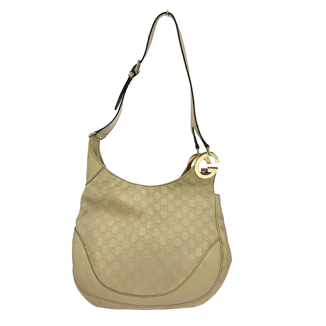 Medium Gucci GG Pattern Beige Leather Vintage Shoulder Bag 203503 486628: Medium Gucci GG Pattern Beige Leather Vintage Shoulder Bag 203503 486628 This Gucci Beige GG Shoulder Bag is a stylish medium-sized accessory that combines luxury with functionality. The bag features 