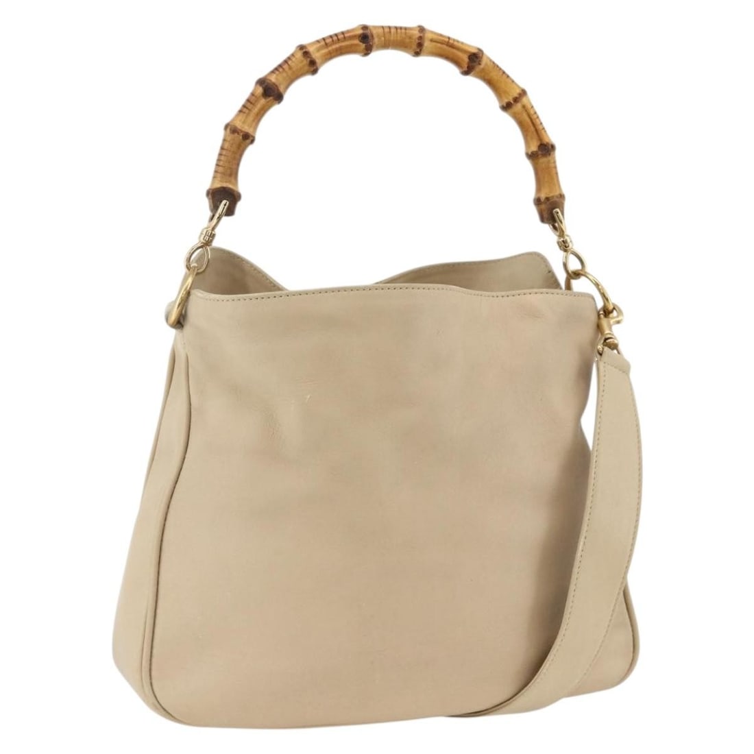 Gucci Bamboo Beige Leather 2way Handbag with Shoulder Strap Gold Accents: Gucci Bamboo Beige Leather 2way Handbag with Shoulder Strap Gold Accents This GUCCI Bamboo Hand Bag is crafted from beige and gold leather and offers versatile 2-way wear with both top handles and a d