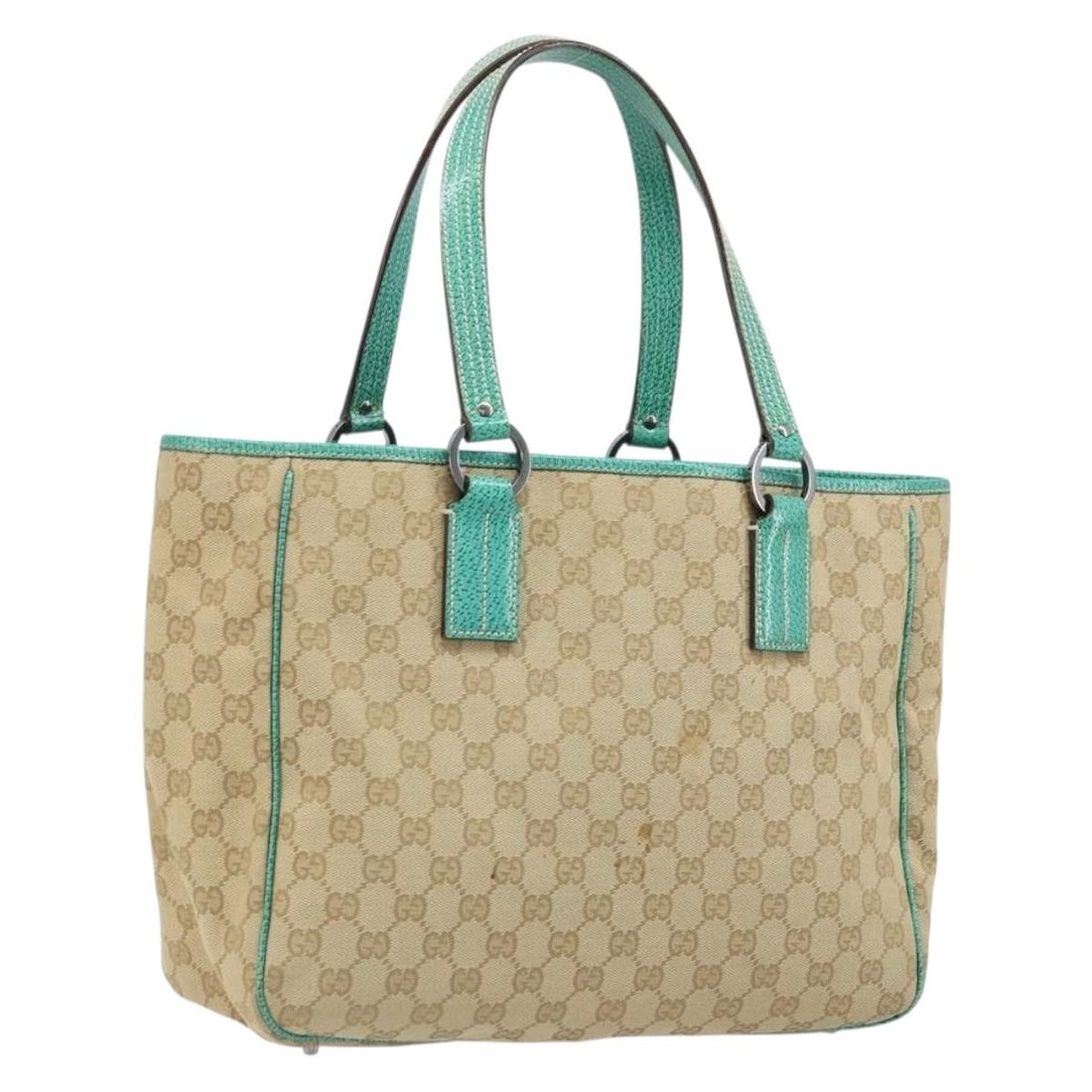 Beige Silver GG Canvas Gucci 113017 Women's Handbag Made in Italy: Beige Silver GG Canvas Gucci 113017 Women's Handbag Made in Italy This GUCCI GG Canvas hand bag features a beige and silver color scheme and is crafted from signature GG canvas material. Designed for 