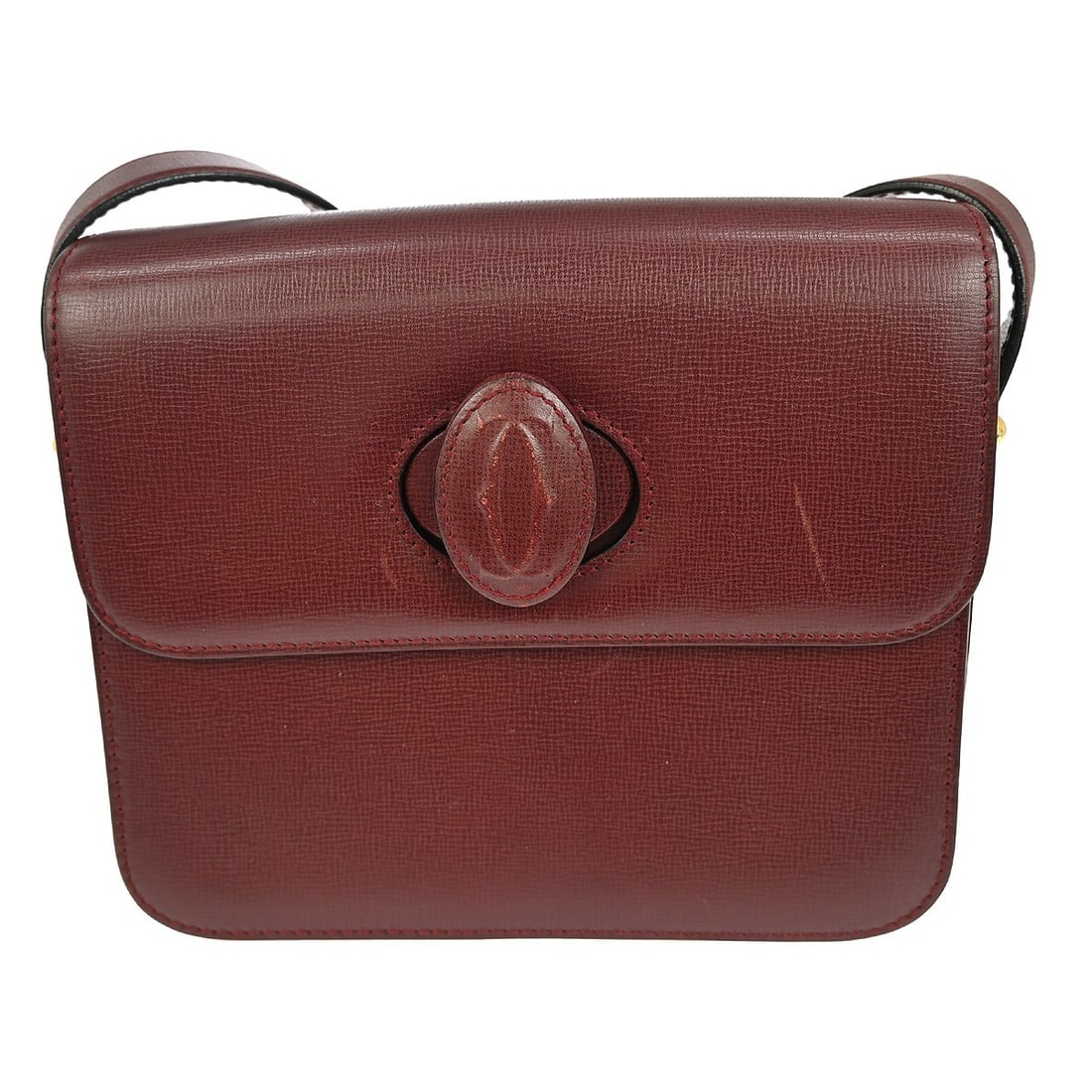 Cartier Bordeaux Leather Vintage Shoulder Bag with Strap and Pockets: Cartier Bordeaux Leather Vintage Shoulder Bag with Strap and Pockets This vintage Cartier Bordeaux Shoulder Bag is a stylish accessory perfect for daily use. Crafted from high-quality leather, it feat