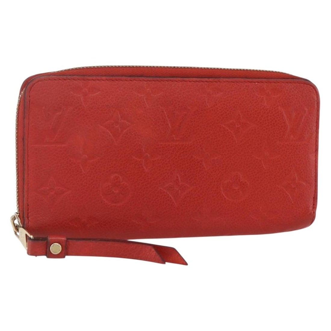 Red Leather Zippy Wallet by Louis Vuitton Portefeuille Monogram Empreinte: Red Leather Zippy Wallet by Louis Vuitton Portefeuille Monogram Empreinte The Louis Vuitton Portefeuille Zippy Monogram Empreinte wallet features a red leather exterior with signature monogram embossi