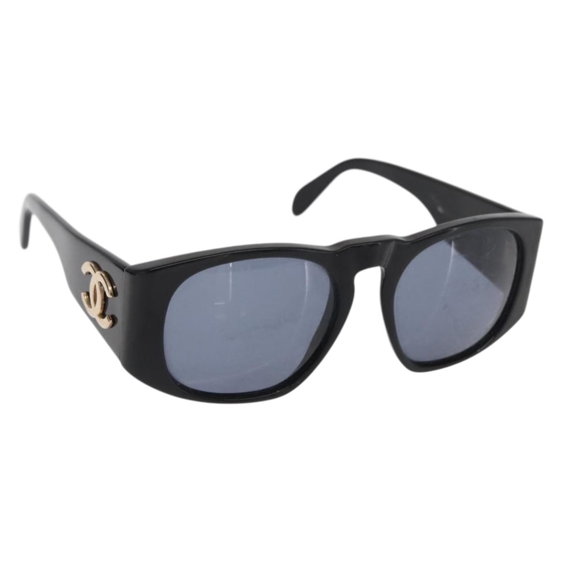 CHANEL Black Plastic Sunglasses with Box Italy: CHANEL Black Plastic Sunglasses with Box Italy These CHANEL women's sunglasses feature a classic black plastic frame and are crafted in Italy. The sunglasses show signs of heavy use, including surface