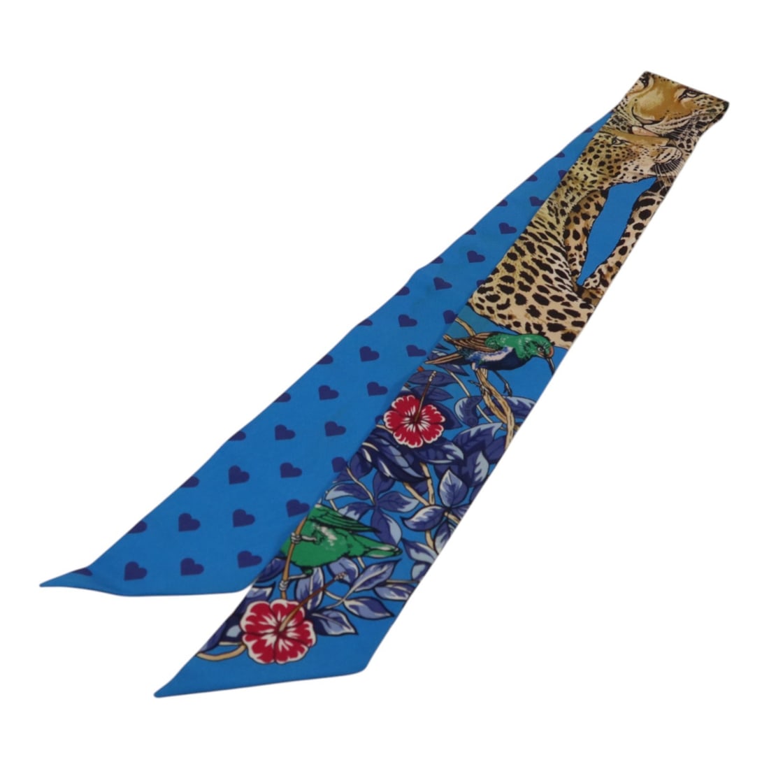 Hermes Silk Twilly Multicolor Blue Brown Women's Scarf: Hermes Silk Twilly Multicolor Blue Brown Women's Scarf This Hermes Twilly scarf is crafted from silk and features a blue, brown, and multicolor design. Made in France for women, it is a regular size a