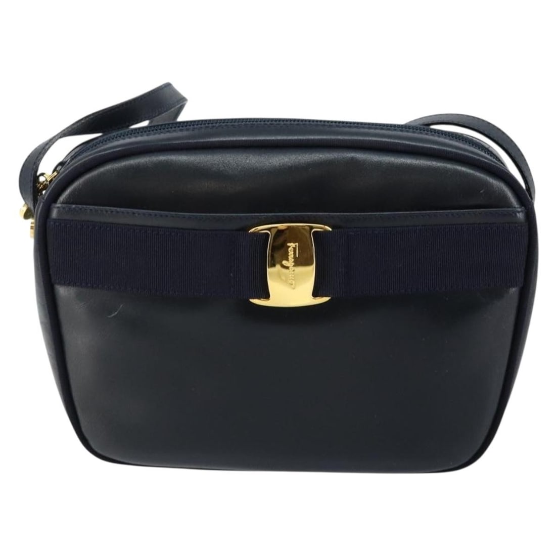 Navy Leather Shoulder Bag by Salvatore Ferragamo Vala: Navy Leather Shoulder Bag by Salvatore Ferragamo Vala This Salvatore Ferragamo Vala shoulder bag features navy leather construction designed for female use. It offers a compact size suitable for every