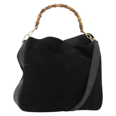Gucci Bamboo Suede 2 Way Shoulder Bag Black Gold Strap: Gucci Bamboo Suede 2 Way Shoulder Bag Black Gold Strap This GUCCI Bamboo Shoulder Bag is crafted from black suede with gold-tone accents and features a versatile 2-way design. The bag includes both a 