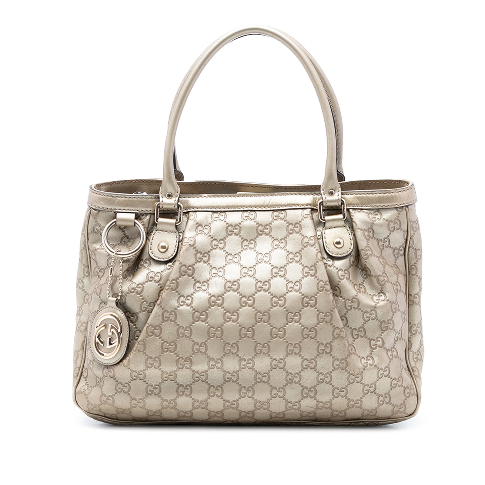 Gucci Guccissima Sukey Gold Leather Tote Bag Italy: Gucci Guccissima Sukey Gold Leather Tote Bag Italy The Guccissima Sukey Tote is crafted from leather and features rolled leather straps, an open top with a magnetic snap closure, and interior zip and 