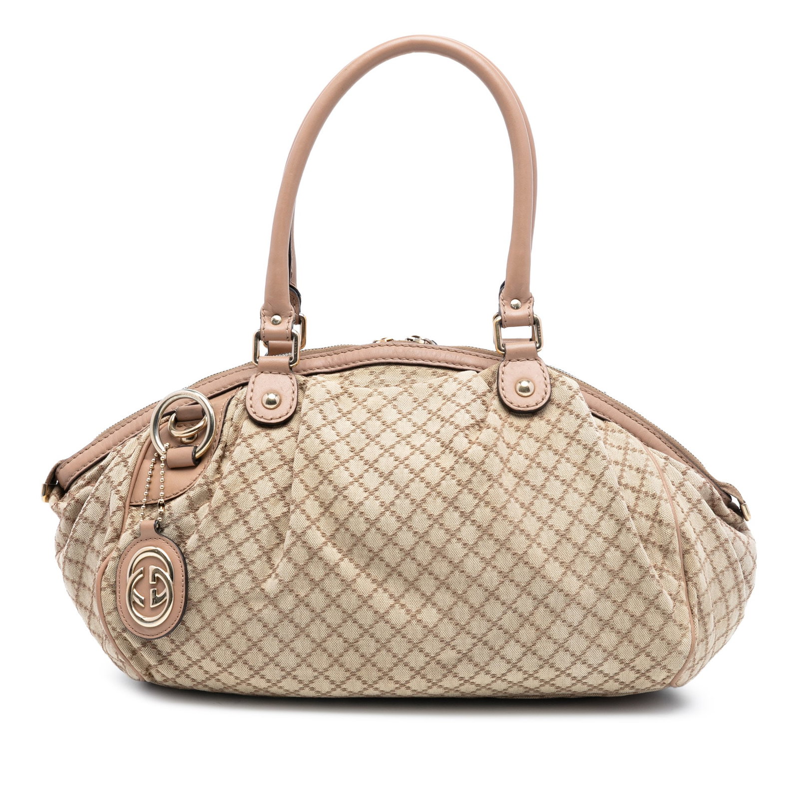 Gucci Sukey Beige Diamante Canvas Satchel with Leather Trim and Strap: Gucci Sukey Beige Diamante Canvas Satchel with Leather Trim and Strap The Gucci Diamante Canvas Sukey Satchel features a beige canvas body with leather trim, rolled leather handles, a detachable flat 